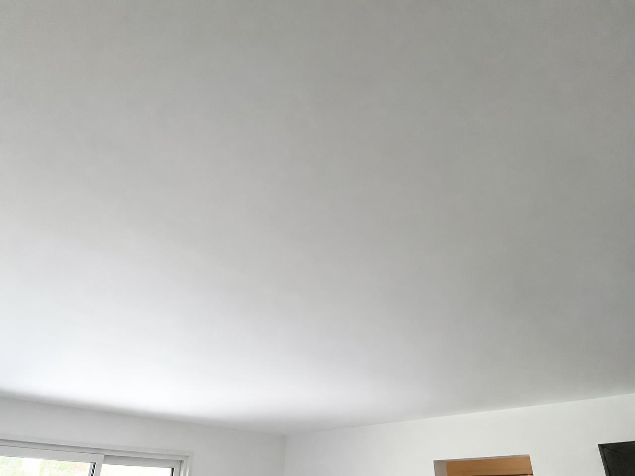 The same ceiling after the seam was re-taped, coated and sanded flat.